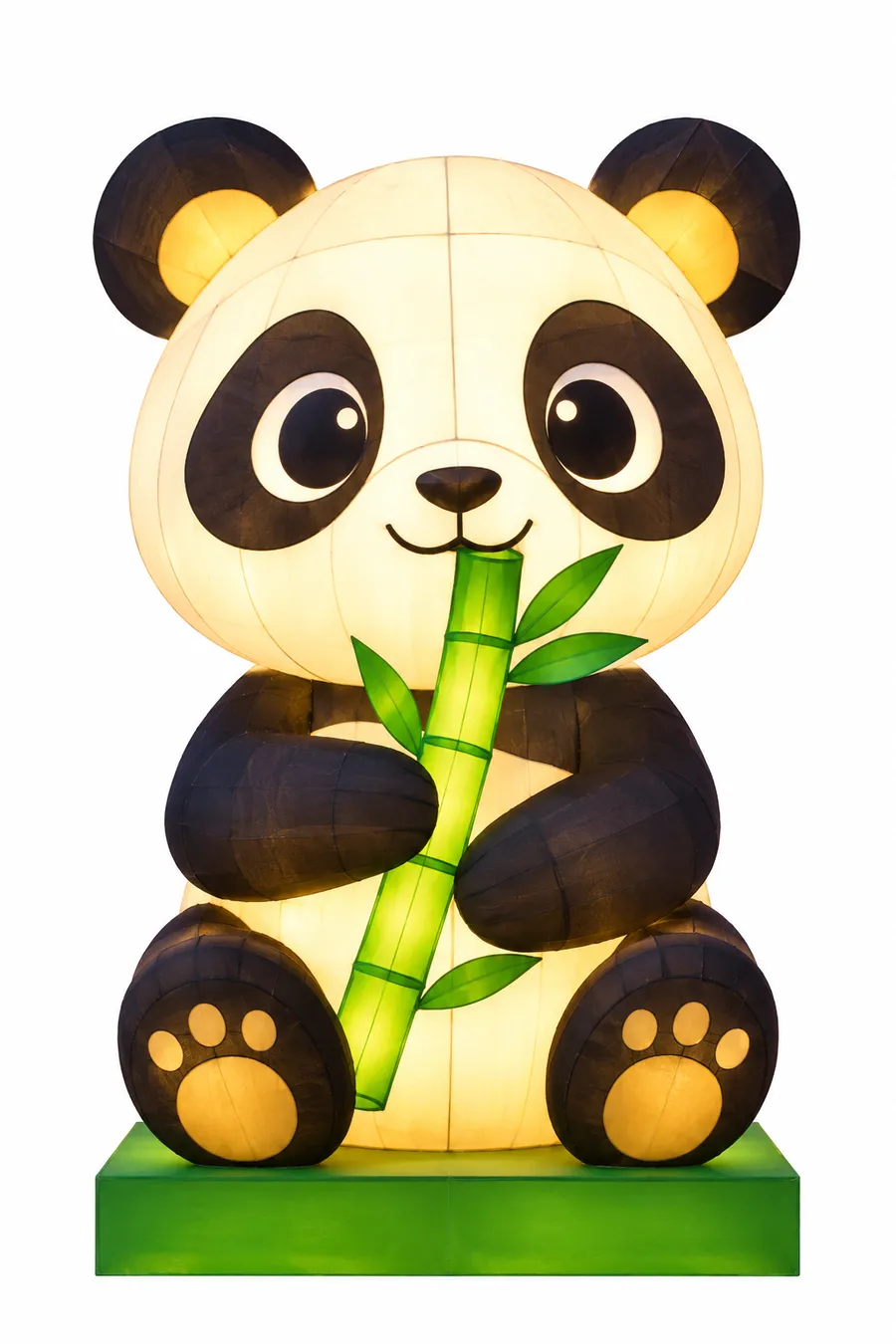 Imagen de referencia generada con inteligencia artificial: oso panda luminoso sentado comiendo bambú, iluminado desde el interior