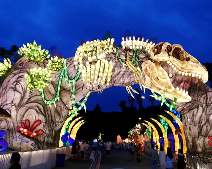 Túnel de esqueletos de dinosaurio luminoso LED